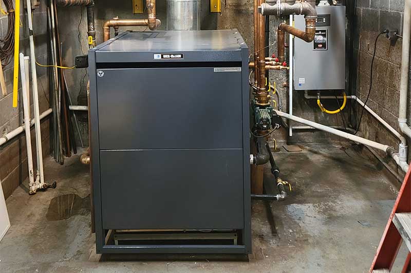 Heat pumps, Radiant Heat Systems, High-efficiency furnaces and boilers as well as oil tank replacement.  This unit is located in a basement.